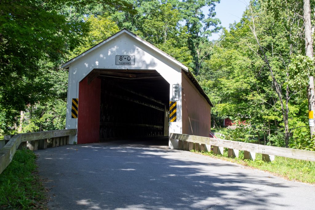 The Adirondack Park is an amazing place to visit when you’re looking to escape the hustle of everyday life, but did you know one of the most relaxing and scenic drives is right outside the Blue Line in Washington County? This beautiful corner of the North Country is home to rolling hills, farmlands, and multiple covered bridges that stand as architectural marvels. Plan a fun-filled road trip to these charming structures, discover their history, and explore the picturesque region.